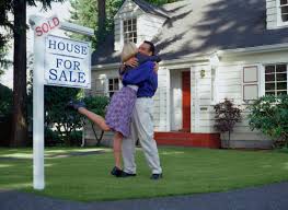 sold-house-hugging-couple